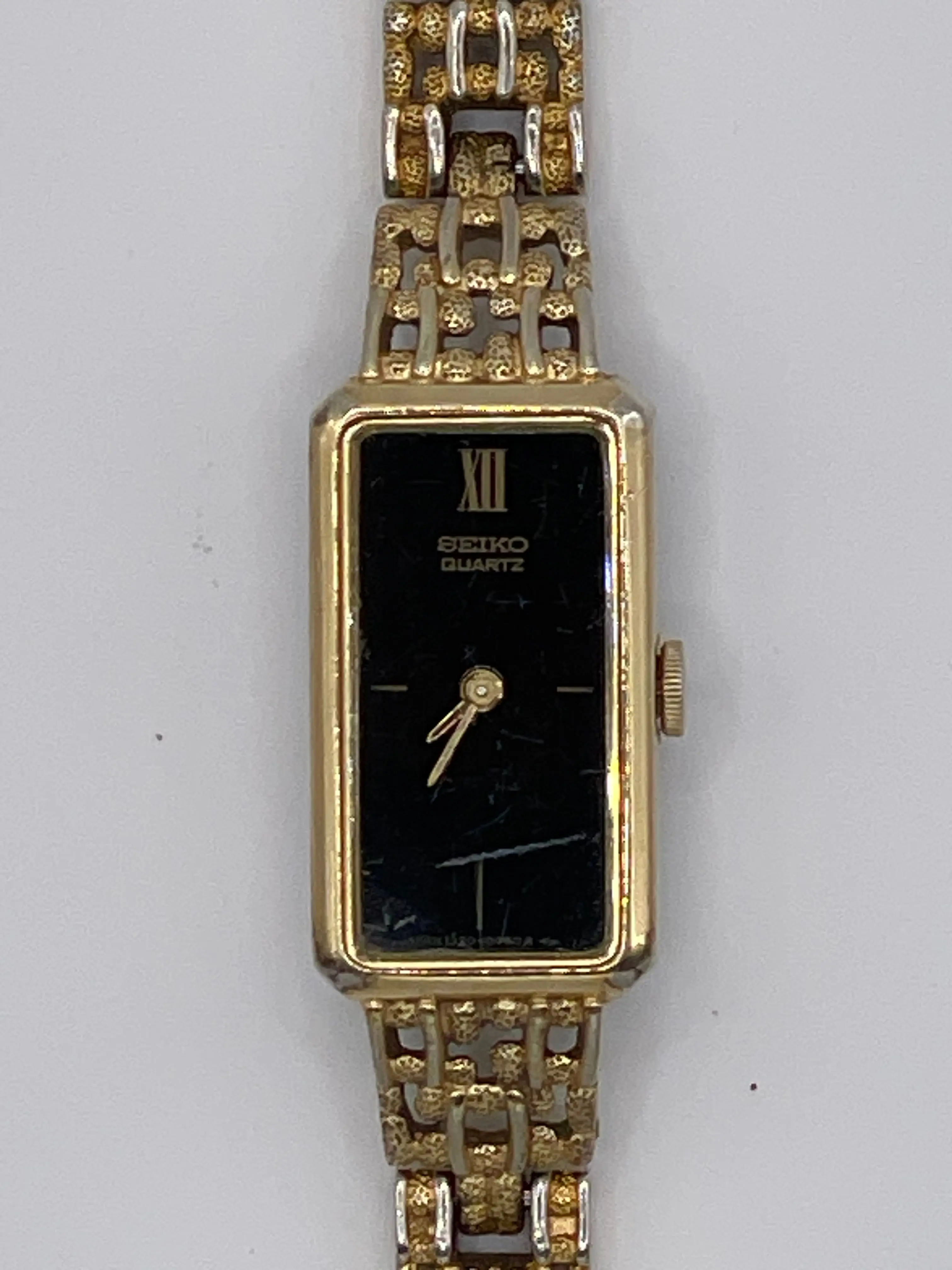 Vintage Seiko Quartz Rectangular Gold-Tone Women’s Watch – Black Dial (Ref. 1320-5249) - Pre-Owned