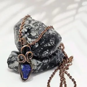 Copper-Wrapped Lapis Lazuli Pendant with Spiral Detail - Unique Design Necklace Featuring Blue Stone and Copper Wire Wrap
