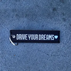 Drive Your Dreams Jet Tag - 5.2"W X 1.1"H High Quality Double Sided Durable Keyring for Everyday Use