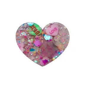 Candy Crush Valentine's Collection 1oz Plastic Heart Shaped Product with Glitter and Love Themed Design