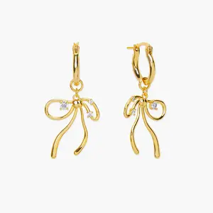 en route the Miffy Earrings in Gold, Exclusive Design Balletcore Ribbon Drops with Shimmering Crystal Details, Perfect for Chic Everyday Styling