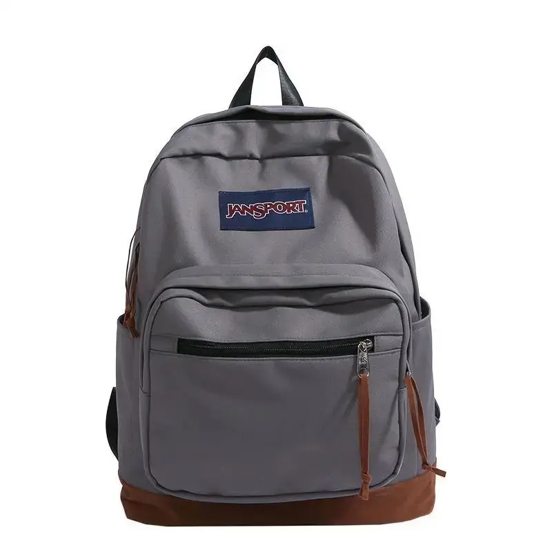 JanSport Retro Gray College Backpack with Built-in 15-inch Laptop Sleeve, Suede Reinforced Bottom, Padded Ergonomic Straps, Durable Campus Bookbag