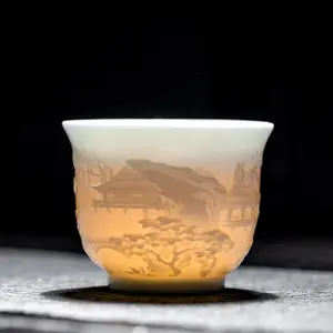Ice-clear white porcelain with mutton fat jade finish, hand-carved relief, Tengwang Pavilion master cup, large kung fu tea cup, personal tea cup