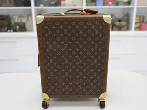 Pre-owned Louis Vuitton CANVAS Luggage ROLLING TRUNK IN MONOGRAM CANVAS
