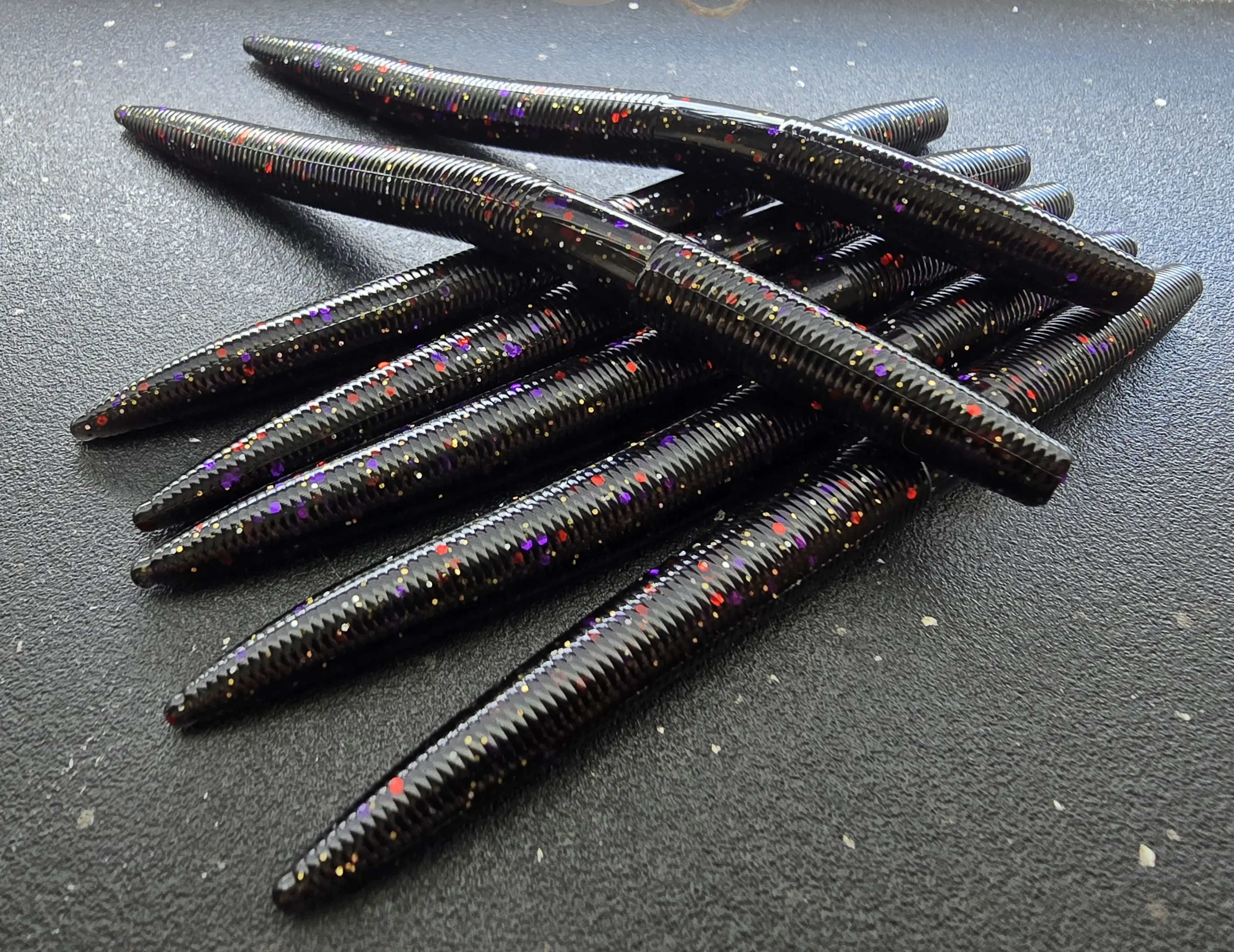Sapper Baits 5" Sapper Stick Bait- Full Battle Rattle- Black with Purple, Red, Gold, Silver Flake