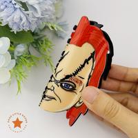 The Stitched Face Doll