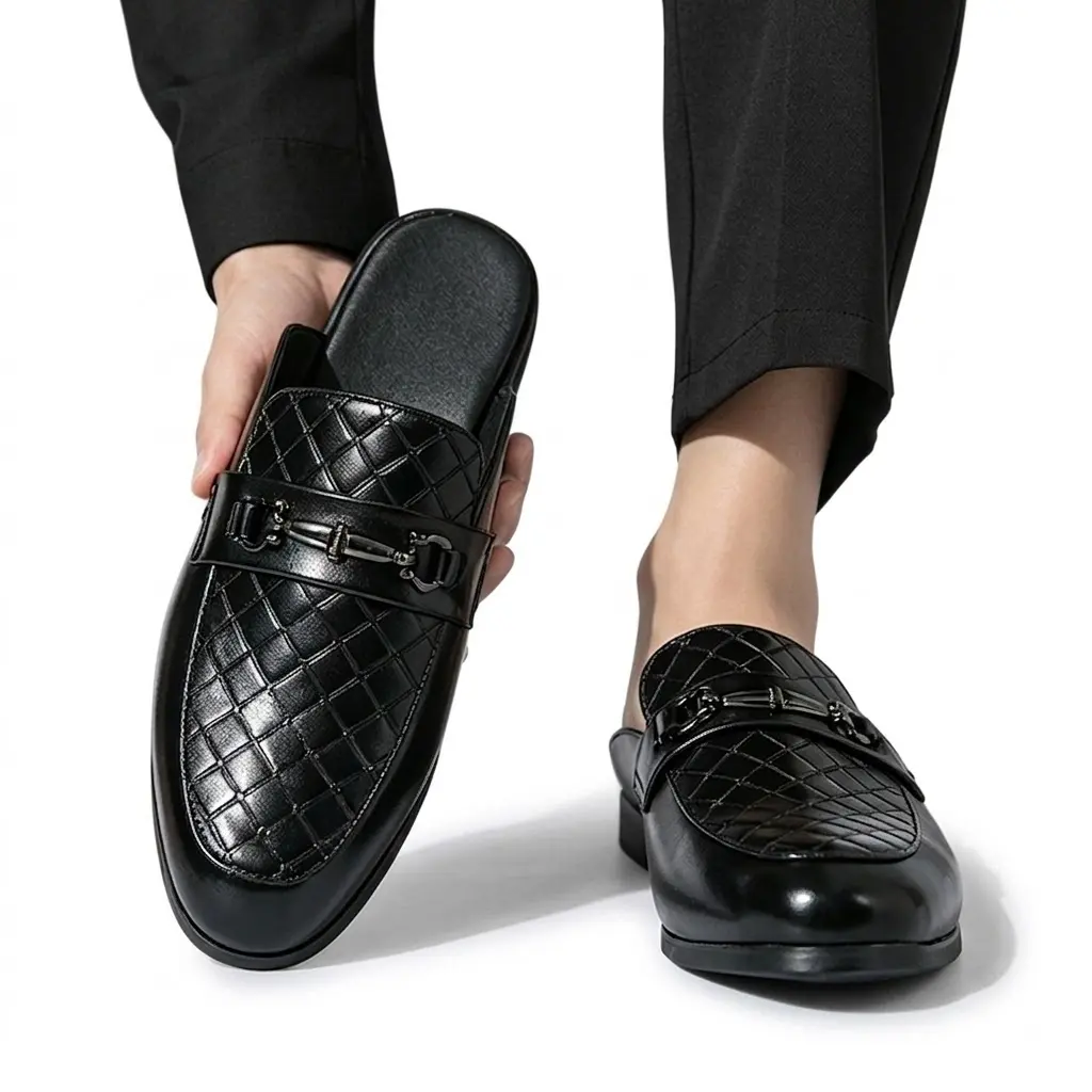 Men’s black leather loafers with diamond texture and silver buckle — luxurious slip-on design, suitable for business and vacations