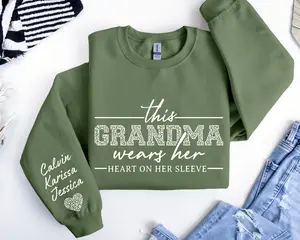 Custom This Grandma Wears Her Heart On Her Sleeve Sweatshirt, Personalized Mom With Kids Names Hoodie, Motherhood Gift, Mother's Day Gifts