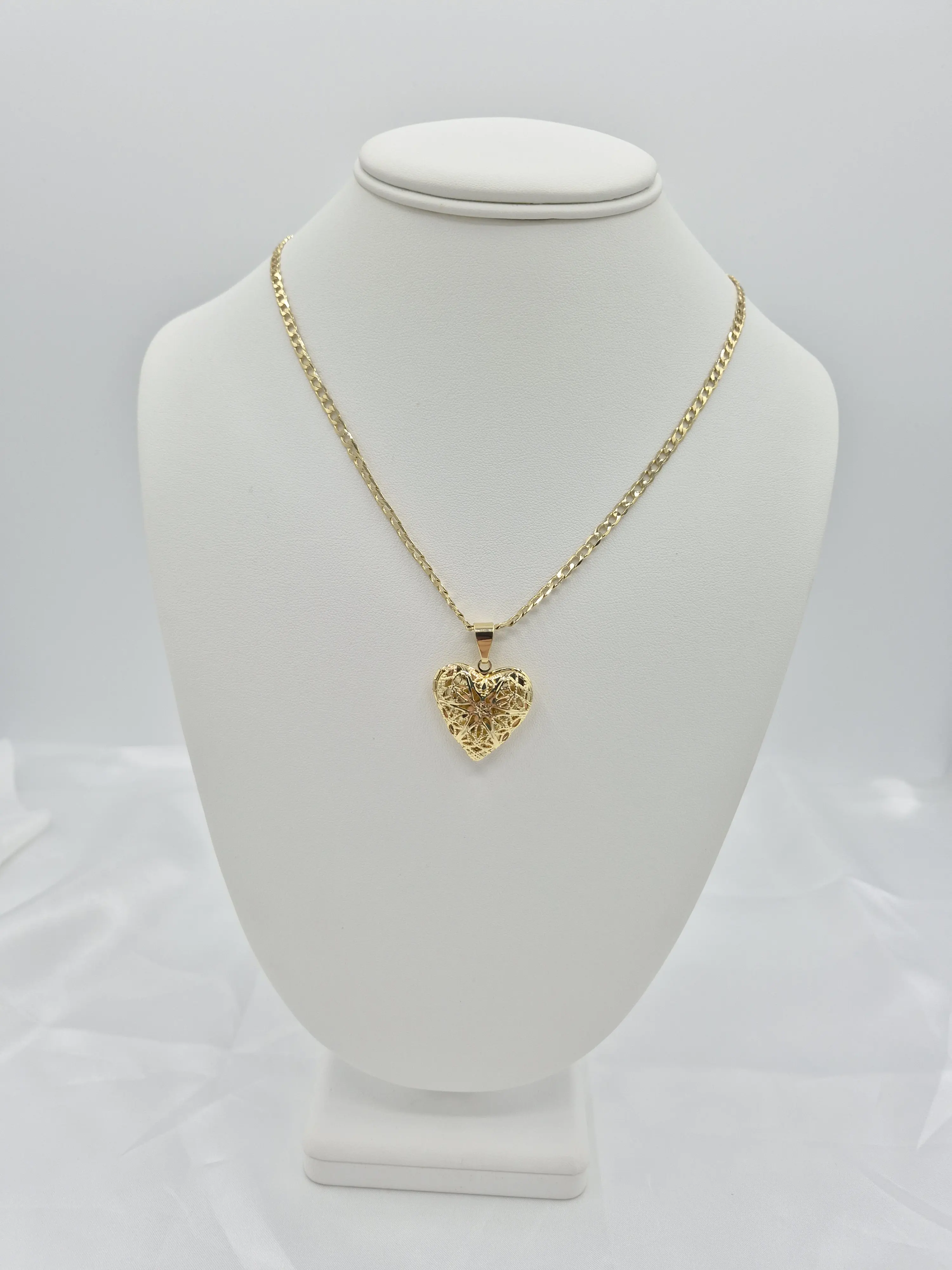 14k gold plated necklace with an opening heart pendant.  (88)