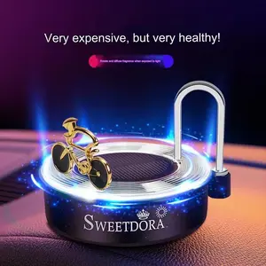 Car air freshener, solar powered rotating bicycle ornaments, car diffuser, ventilation perfume essential oil, car aroma diffuser
