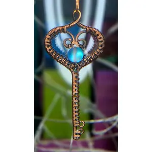 Key To My Heart – Copper Woven Key Pendant with Luminous Blue Bead