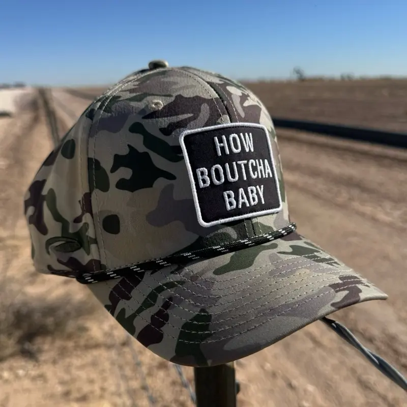 How Boutcha Baby Camo Snapback Hat. “DO NOT LET THE BOYS GET HOT” embroidery on side of hat. Black & White Patch Design and Adjustable Strap for Men and Women