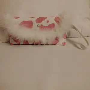Custom Clutch Purse with Pink and White Feather Accents and Adjustable Strap for Stylish Everyday Use