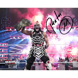Penta WWE Autographed 8" x 10" Raising Intercontinental Championship Photograph