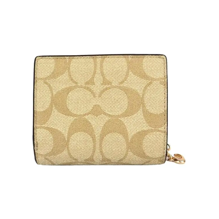 COACH Snap Wallet with Snap Closure, Three Card Slots, Signature Coated Canvas and Smooth Leather for Women in Khaki and Saddle Color