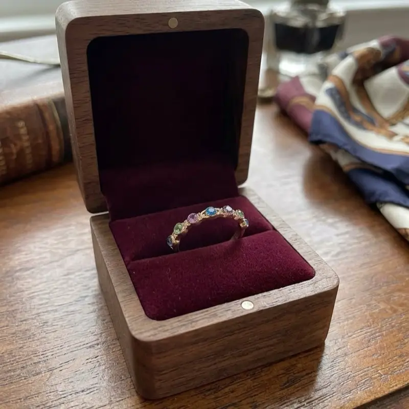 multi-gemstone rainbow infinity band