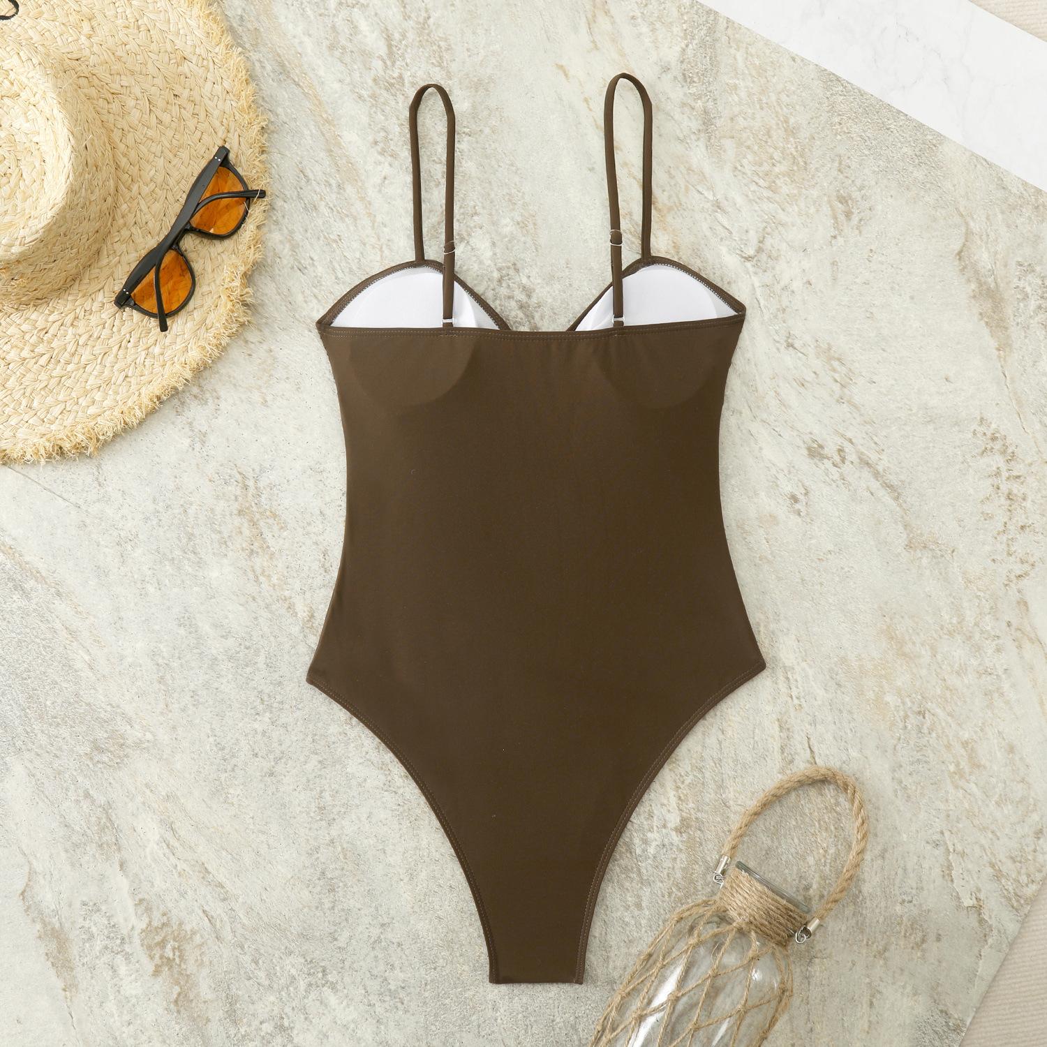 European and American sexy slim-fit women's swimwear wholesale in Xingcheng, nylon swimsuit with metal shell decoration, one-piece swimsuit