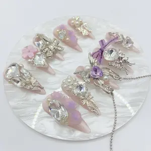 Light pink cat eye with butterfly decorations press on nails