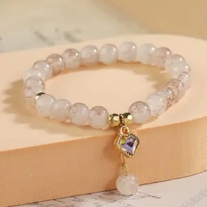 Rhinestone charm beaded bracelet