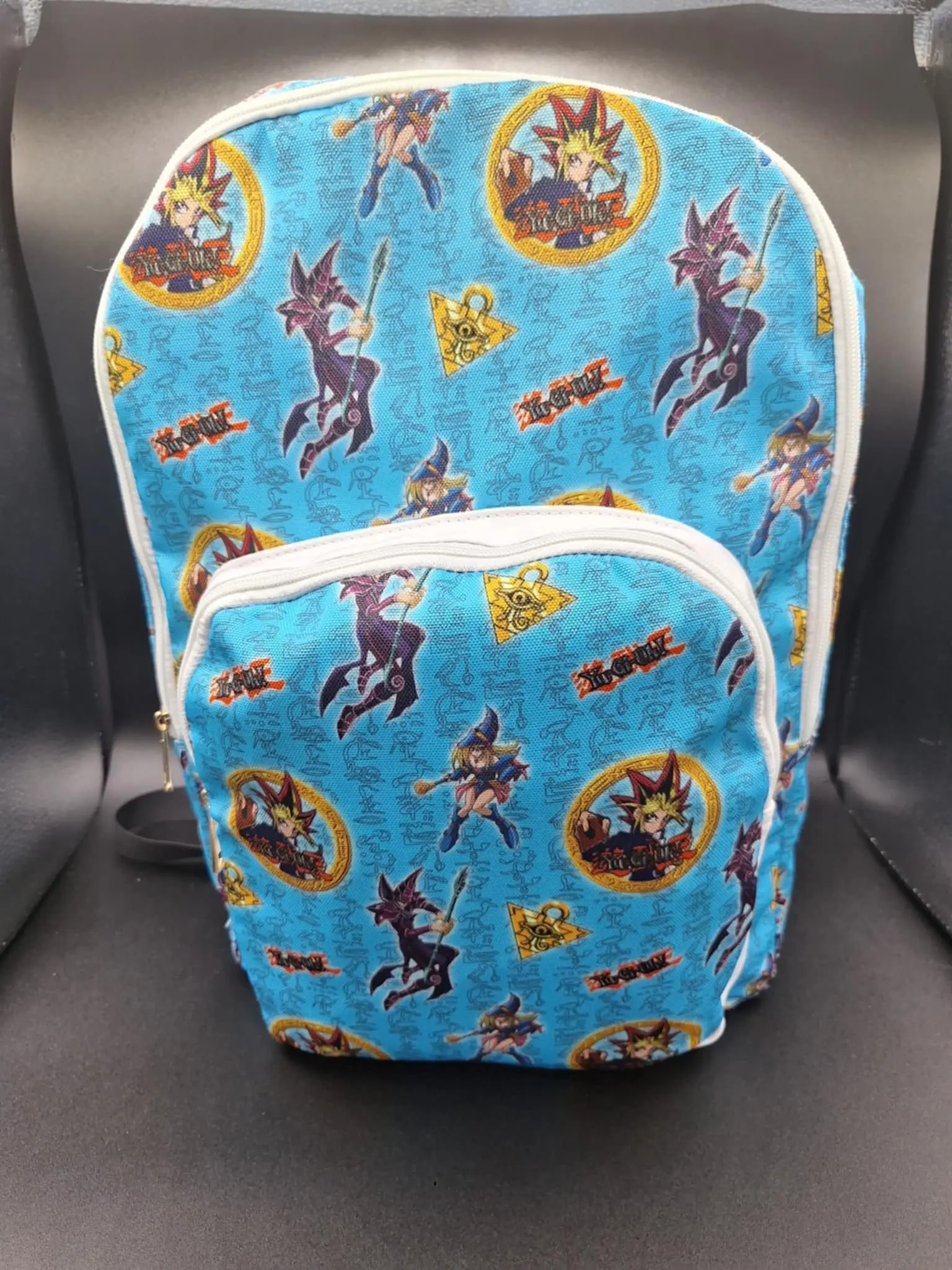 Yu-Gi-Oh! Anime Backpack for Fans, Officially Licensed 18-Inch Canvas Bag with All-Over Character Print, Padded Pocket & Zip Closure, Campus Life, Character Decoration Backpacks, Yu-Gi-Oh Fans, All Over Print, Hieroglyphic Pattern, Multi-Function, Padded,