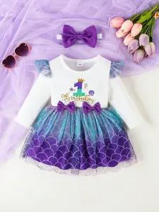 Baby girl's dreamy and sweet style, mermaid element pattern, "1st Birthday" words, round neck, long sleeves, mesh ruffle sleeves, bow decoration, mesh fishtail skirt, short skirt shape, birthday party, spring and autumn baby clothes