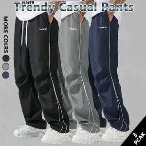 Loose Fit Men's Trousers with Grey Side Stripes and Gold Trim Stripes Comfortable Design Sports and Casual Style Bottoms Sweatpants Fitness Wear Fashionable and Versatile