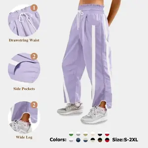 Women's loose wide leg pants, casual drawstring elastic waist, contrasting color sports pants Y2K Track pants, exposed navel, comfortable and lightweight outdoor wear, flared wide leg sports pants, jogging pants, fitted parachute sports pantsRAIMENTRY