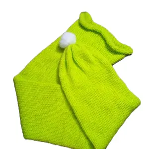 lime green knitted stocking cap hat with white pompom