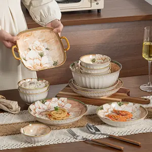 24/36/48-piece ceramic dinnerware set, including a plate and bowl combination, featuring an elegant camellia pattern, a durable scratch-resistant surface, and a space-saving stackable design. Suitable for use in microwave ovens, dishwashers, and ovens.
