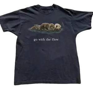 National Geographic with "Go with the flow" Baby Tee