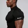 Men's Slim Fit High Neck Workout T-Shirt with "BEAST" Cuff Print, Short Sleeve Compression Training Top, High Stretch Polyester Blend, Fitness Clothes, Ideal for High-Intensity Workouts, Strength Training, Streetwear
