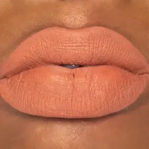 UnButton: Velvet Lipstick, By EyeDesireCosmetics Long lasting, Tosted Tan shade, matte finish Lipstick