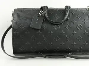Pre-owned Louis Vuitton leather Travel Bags x EDUN Monogram Revelation Keepall 45 Bandouliere