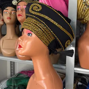 Queen Moore Black and Gold Embroidered Headwrap with Elegant Design