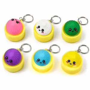 Glow Dumpling Keychain Toy – Cute Pressable Mini Charm with Soft Light, Squishy PVC Stress Relief Gift for Bags, Keys & Party Favors