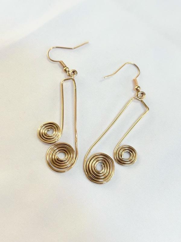SCS-MTER-002 Golden Metal Echo 2” Earrings with Spiral Design and Hook Closure