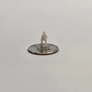N Scale Cowboy – Foot on Barrel | Unpainted Western Miniature for Dioramas & Train Scenes