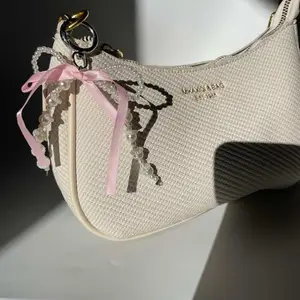 Maison Bag Pretty in Pink Charm Cream Woven Shoulder Bag with Pearl Beaded Bow and Gold Hardware