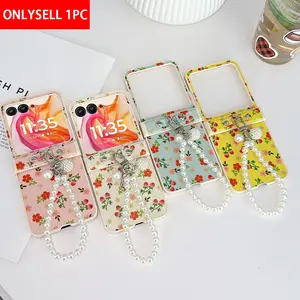 Glittering floral pattern phone case with hinge protection, comes with a pearl bracelet. The hard PC back plate protective phone case is suitable for Motorola Razr 2024, Razr 2025, Razr 2026, Razr 70 Ultra Accessories Cover