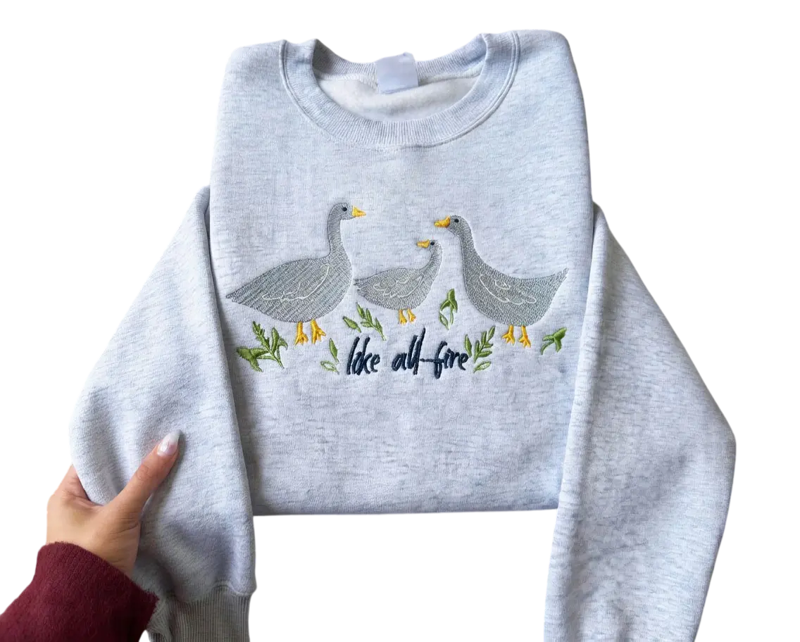 Like All Fire Goose Embroidered Sweatshirt Sweatshirt, Goose Shirt, Cute Goose, Sunrise on the Reaping shirt, The Hunger Games bookish merch