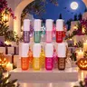 SOLO EN IBIZA 8-Piece Shimmer Body Mist, 8 Scents, 30ml x 8 Travel Size Body Sprays with Keychain & Bag Charm, Sparkling Glow, Cruelty-Free
