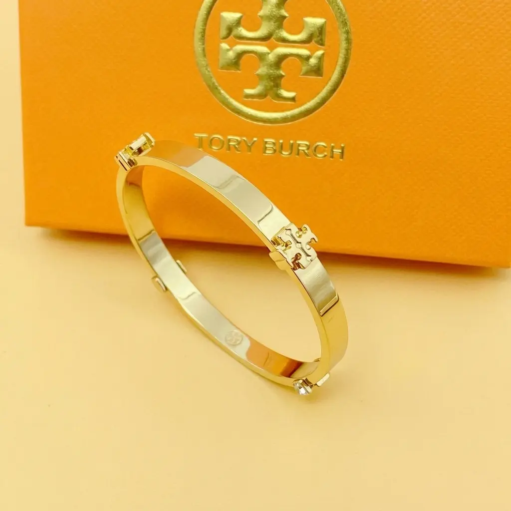 Tory Burch Women Round Hinged Bangle, Signature Logo Metal Bracelet in Multi-Tone Finishes Tory Burch Women Round Hinged Bangle, Signature Logo Metal Bracelet in Multi-Tone Finishes
