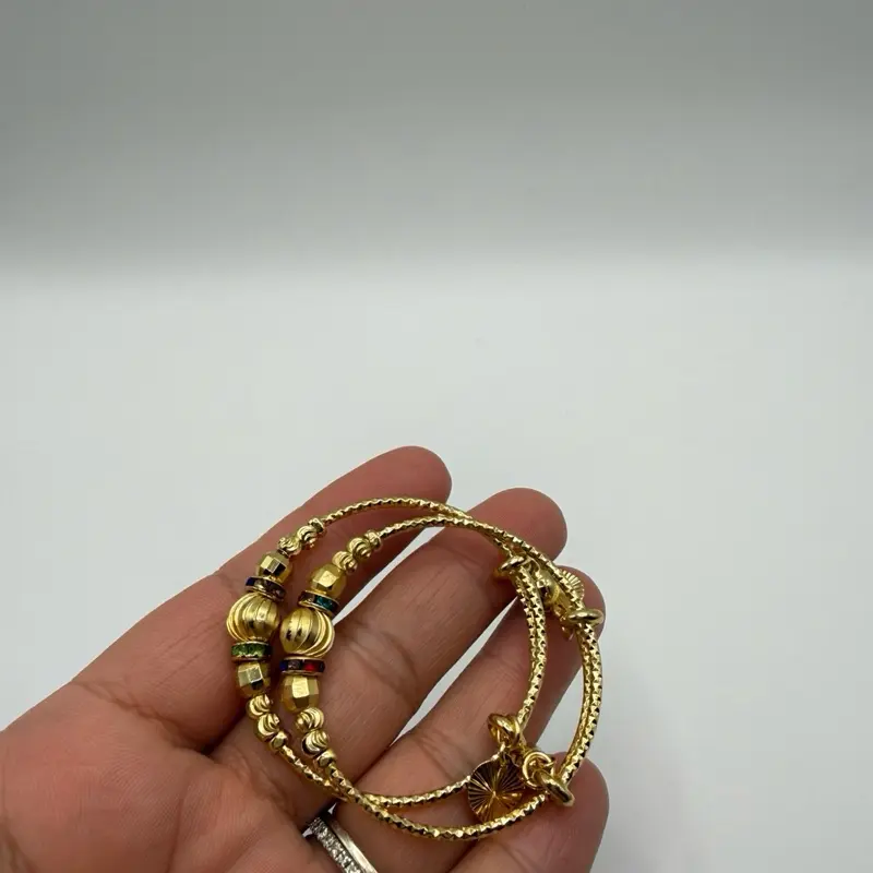 Adjustable gold plated bangles