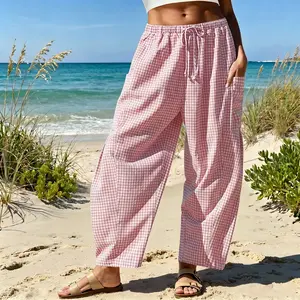55% cotton, 45% polyester; women’s wide leg plaid striped pants, casual barrel fit, relaxed drawstring, low rise palazzo/ham pant style with pockets; suitable for everyday wear, travel, vacations, seaside, beach, and parties.