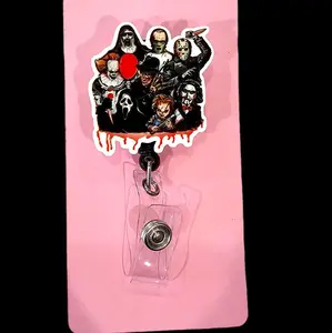Horror Movie Guy's Badge Reel - Character Design with Red Accident, Includes Clip Attachment for Easy Display