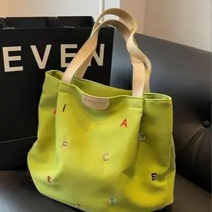 Large capacity canvas bag, new trendy embroidered letter tote bag for women, fresh and cute shoulder bag.