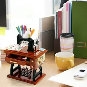 Retro sewing machine mini music box, retro sewing music box, mechanical clock home handicraft, tabletop decoration, as a birthday gift, suitable for giving to children.