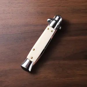 Multifunctional camping knife with a comfortable non-slip handle, comes with a black sheath, suitable for peeling in the home kitchen, outdoor camping, barbecues, and cooking.