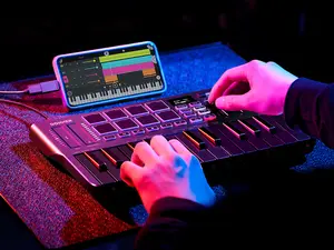 Donner DMK25 Pro MIDI Keyboard Controller, 25 Mini Key Portable USB-C MIDI Keyboard with 8 Drum Pads, OLED Display, Personalized Touch Bar, Music Production Software and 40 Free Courses