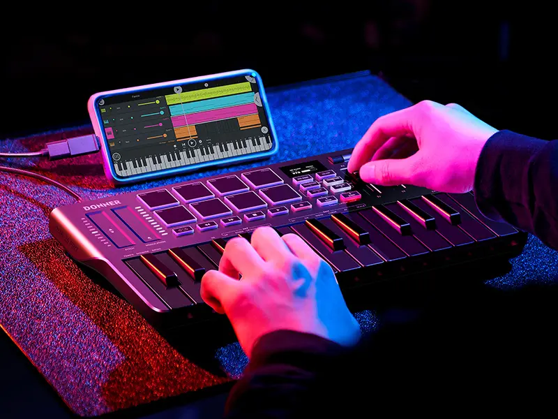 Donner DMK25 Pro Digital MIDI Keyboard Controller - 25 Mini Keys, Portable USB-C MIDI Keyboard, 8 Drum Pads, OLED Display, Personalized Touch Bar, Music Production Software, 40 Free Courses